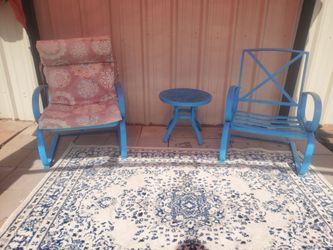 Outdoor metal chairs and small table