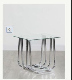 2 Coffee tables made of glass and steel
