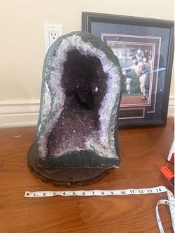 Amethyst geode with wooden stand