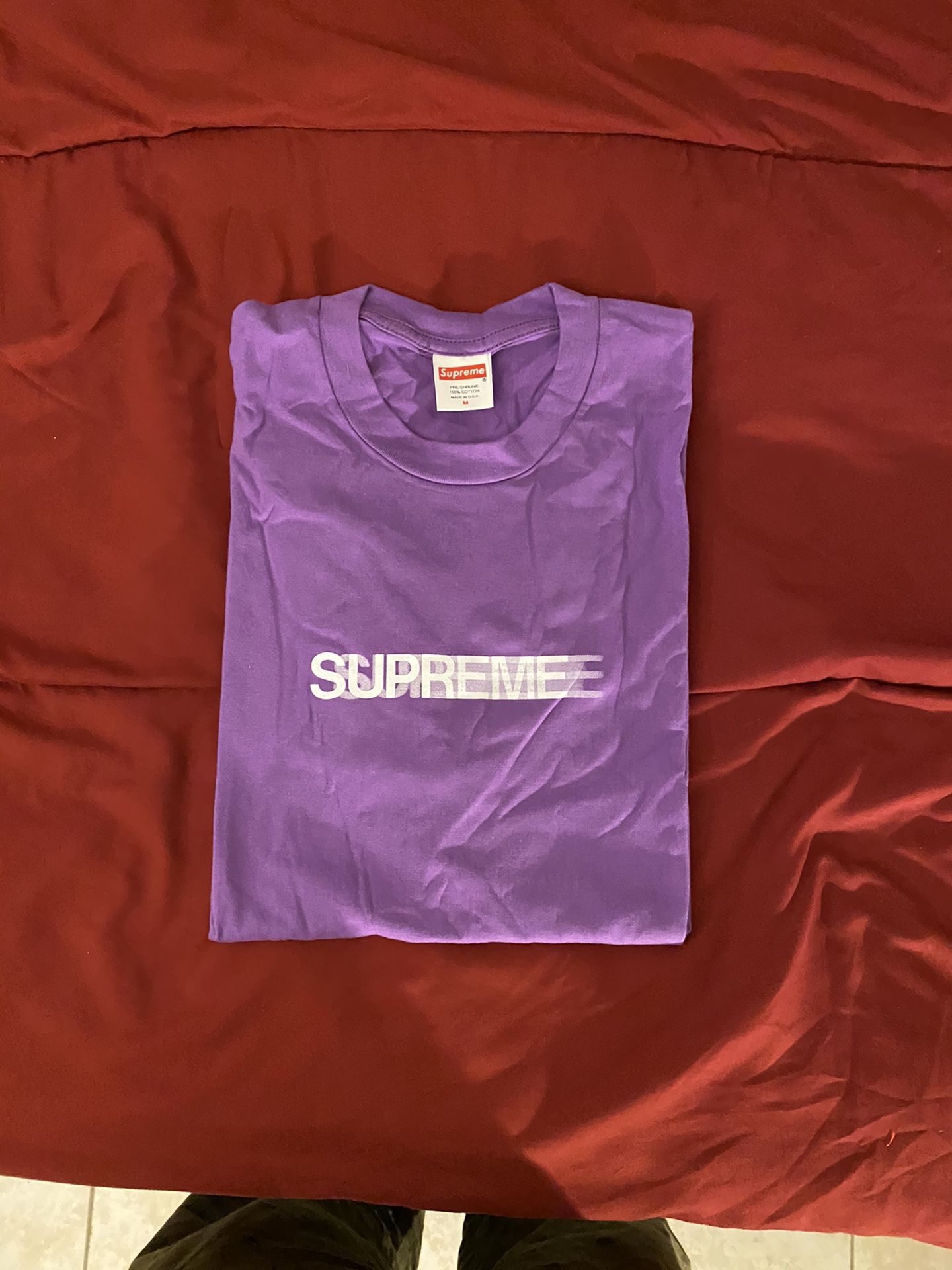 Supreme Motion Logo