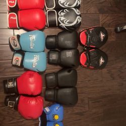 8 Used Boxing Gloves