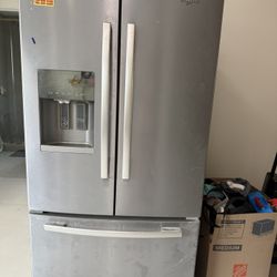 Whirlpool stainless steel French-door refrigerator.