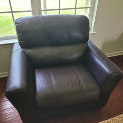 Brown powered reclining leather Sofa, Loveseat and Chair.