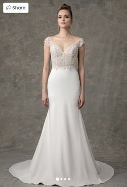 Designer, hand-beaded Enaura Bridal wedding gown