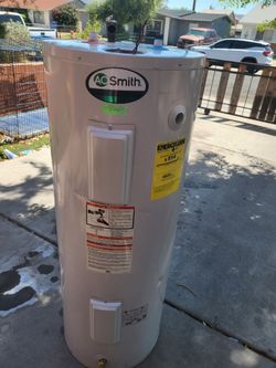 Electric Water Heater 50 gal in good condition and Warranty Works Great 19th Ave And Baseline pick up only