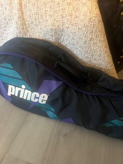 4 GREAT TENNIS RACKETS ON ON WILSON WITH CASE AND THE 3prince comes with double carrying case and another prince padded case with an extra case