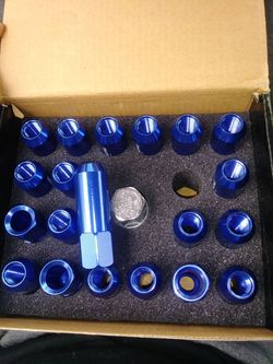 Blue extended lug nut make an offert