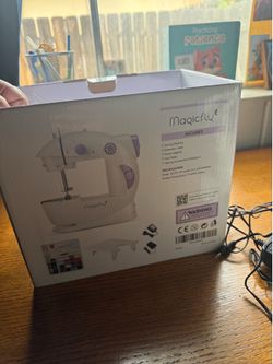 Mini sewing machine