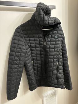 Reebok quilted puffer jacket in size Large.