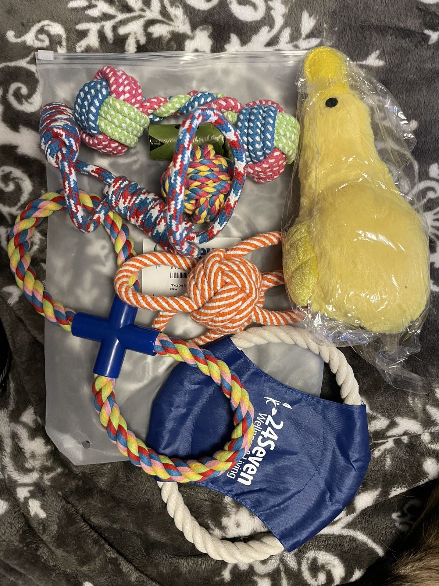7 Pc Indestructible Dog Toys w/roll of waste bags