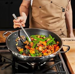 Brand NEW Factory Sealed in box! Amazon sells $189.00 Chef Gordon Ramsey Metal utensils won't scratch the hybrid surface / Even heating from