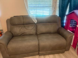 2 Power reclining Sofa and 3 piece table set