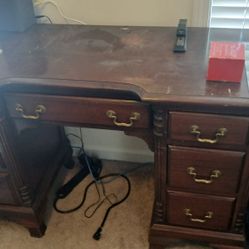 This is a vintage Pennsylvania House walnut kneehole desk