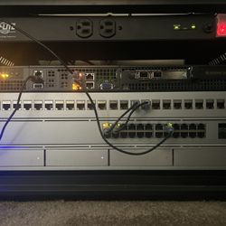 Tripp Lite 12 Outlet Isobar Rackmount PDU, 15A Surge Protected Power Strip, 15ft Cord, 5-15P, & $25K INSURANCE (ISOBAR12ULTRA), Grey
