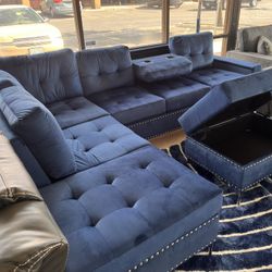 Blue Color Sectional With Cup Holder. Storage Ottoman Included 