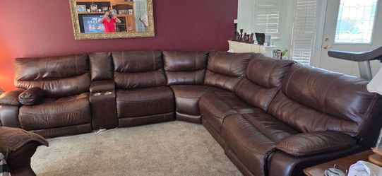 ASHLEY FURNITURE 3 RECLINER SECTIONAL COUCH AND LOVE SEAT WITH WEDGE.  ALL WORKING CHAIRS. LEATHER EXCELLENT CONDOTION .