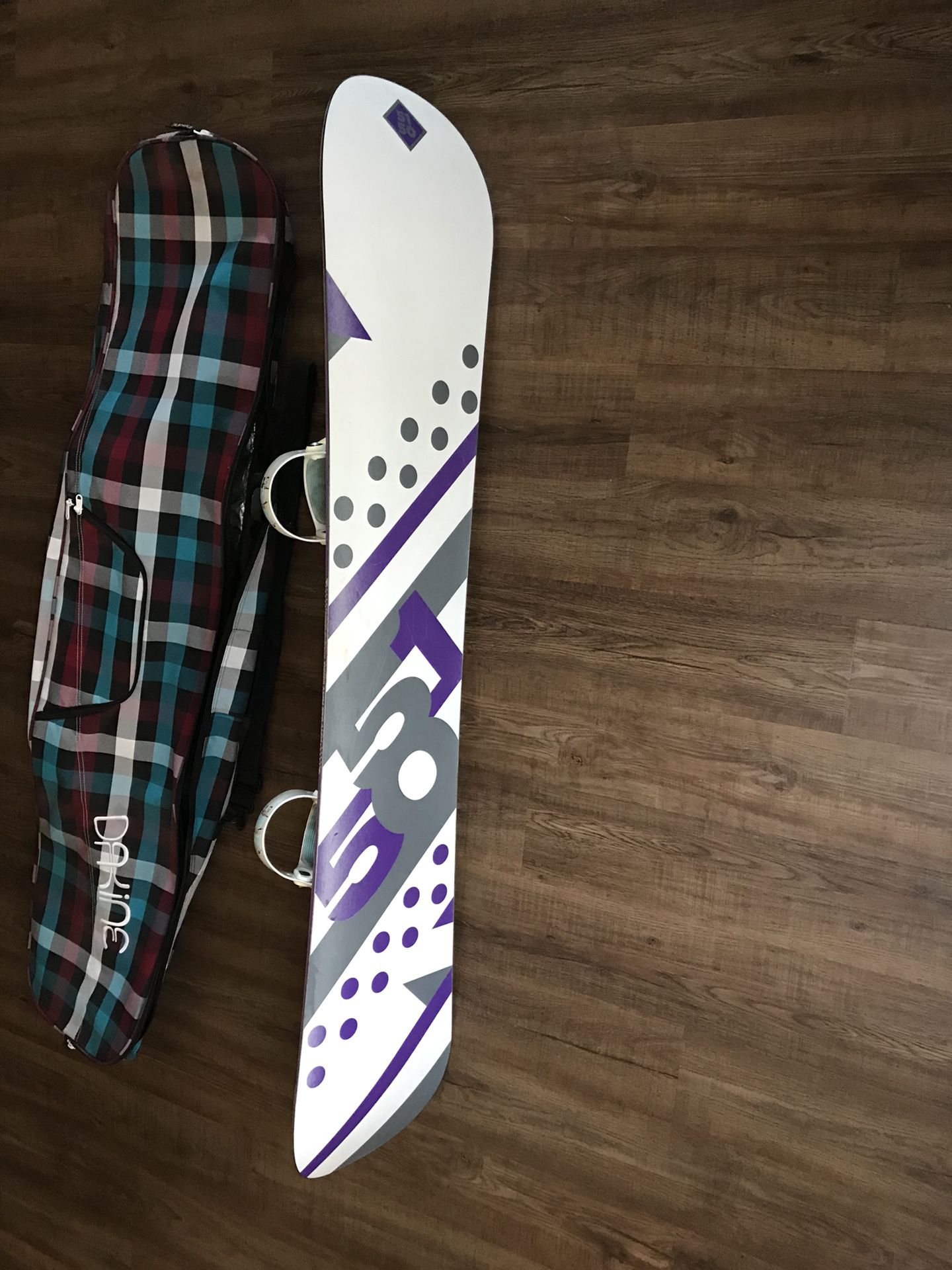 Women’s Snowboard and Ride bindings and bag $150