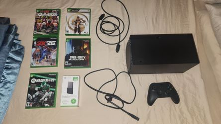 XBOX SERIES X WITH 2TB EXPANSION CARD AND GAMES