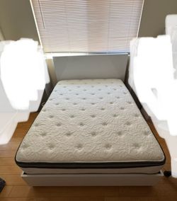 Full-size bed with mattress. 54”