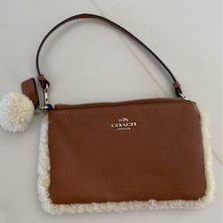 Brand new Coach mini hand purse 