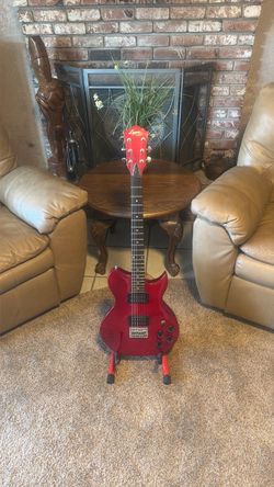 Lyon by Washburn Electric Guitar in deep Red. This is a solid, good looking guitar. ⭐️ Practice Amplifier included ⭐️ Helping beginners begin .!!