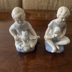 Boy And Girl Porcelain Figurines