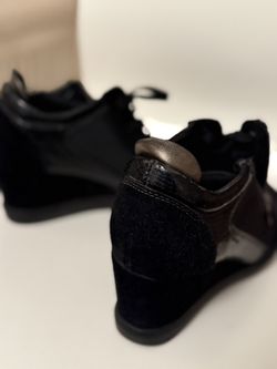 Black platform sneakers