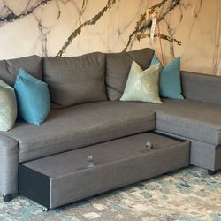 Gray Sectional Couch With Storage and Pull Out Bed