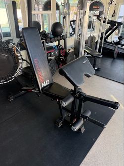 Versatile incline/decline/flat bench withe preacher curl and leg extensions
