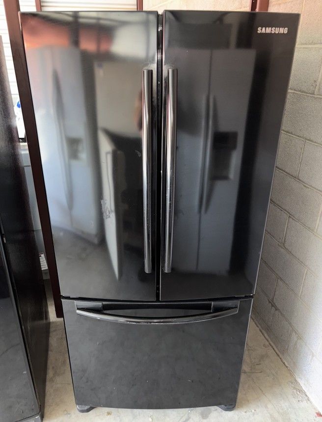 Black Samsung Refrigerator And Freezer