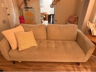 Mid century modern tufted sofa