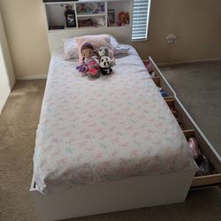 Twins beds with storage and bookcase headboard