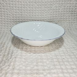 Corelle 1 white swirl bowl with grayish blue trim. Measures 7 1/4" wide . Good condition and smoke free home .