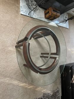 36 Inch Glass top coffee table.