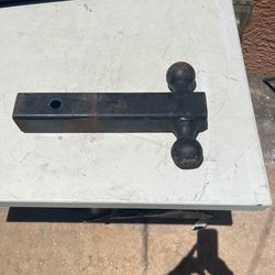 Truck hitch brackets in good condition. One side measures 1 7/8 inches, and the other side measures 2 inches.