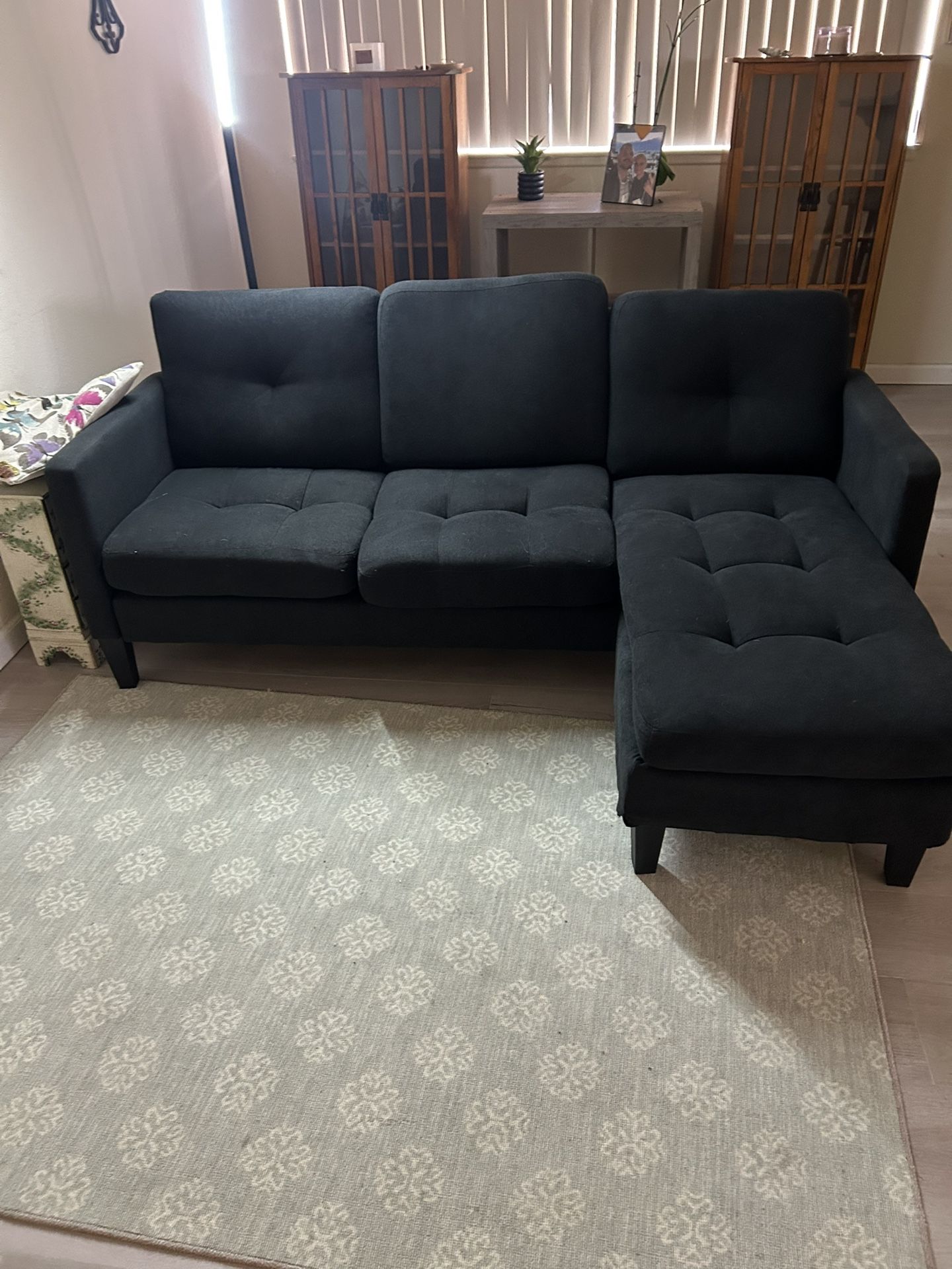 small black sectional couch