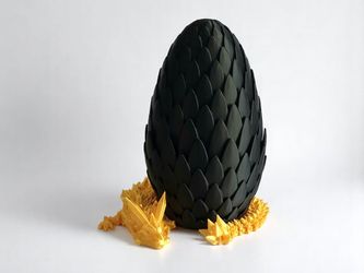 3D Printed Flexible Articulate Gold Dragon With Black Dragon Egg Fidget Toy