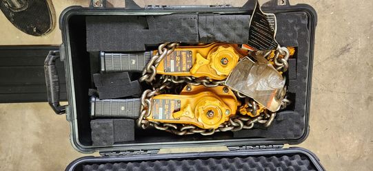 Pair Harrington 2 3/4 ton lever hoisting with rolling case.