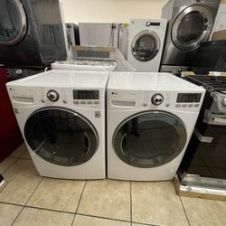 Lg TrueSteam Front Load Washer And Electric Dryer 