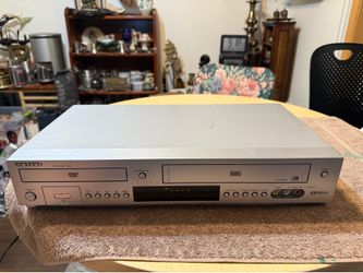 Samsung DVD VCR Combo Player. Model DVD-V8600. Has Progressive Scan and 4 Head Hi-Fi Stereo for VHS. Multi-Card Input too. Supports DTS and Dolby Digi