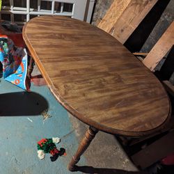 Dining Room Table. Can Transform From Round To Oval. 