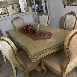 Elegant  tablet with French Style Dining Chairs – Set of 8 – Great Condition + China Cabinet – MUST GO –