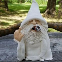 White gnome figurine with middle finger and cigar