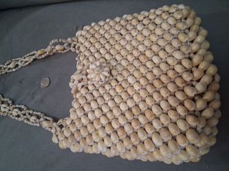 clutch purse made from string and sea shells