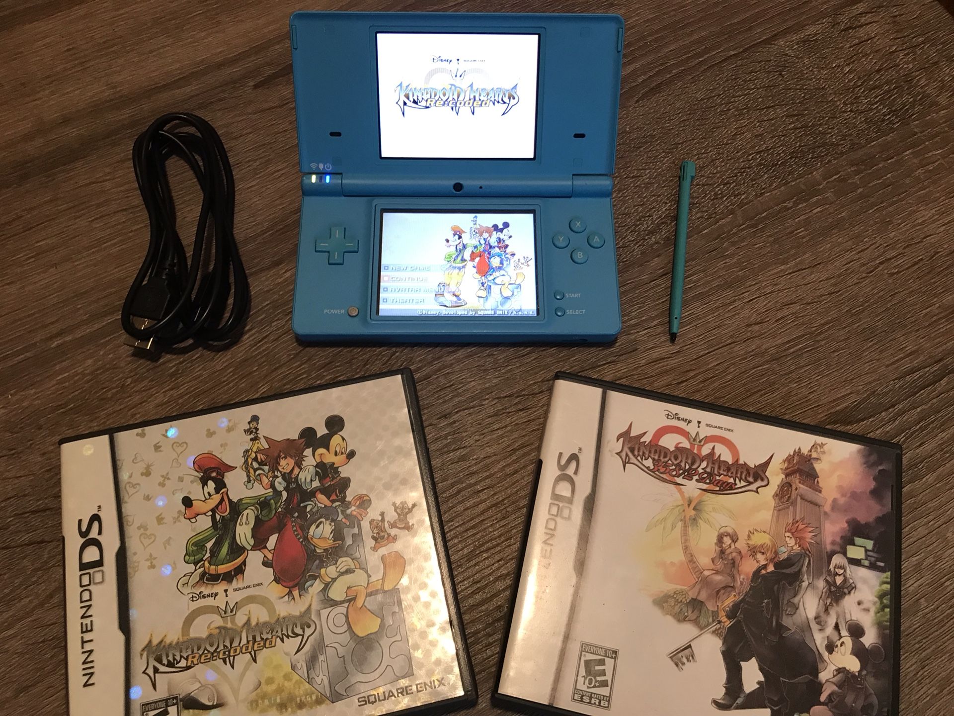 Nintendo DSi with 2 kingdom hearts games