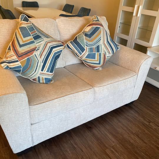 Loveseat (Ashley's furniture) with 4 year protection plan