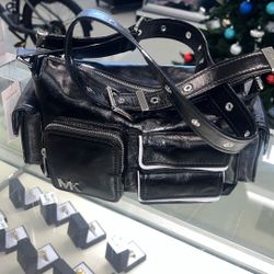 Michael Kors Dakota Medium Leather Shoulder Bag in black. 