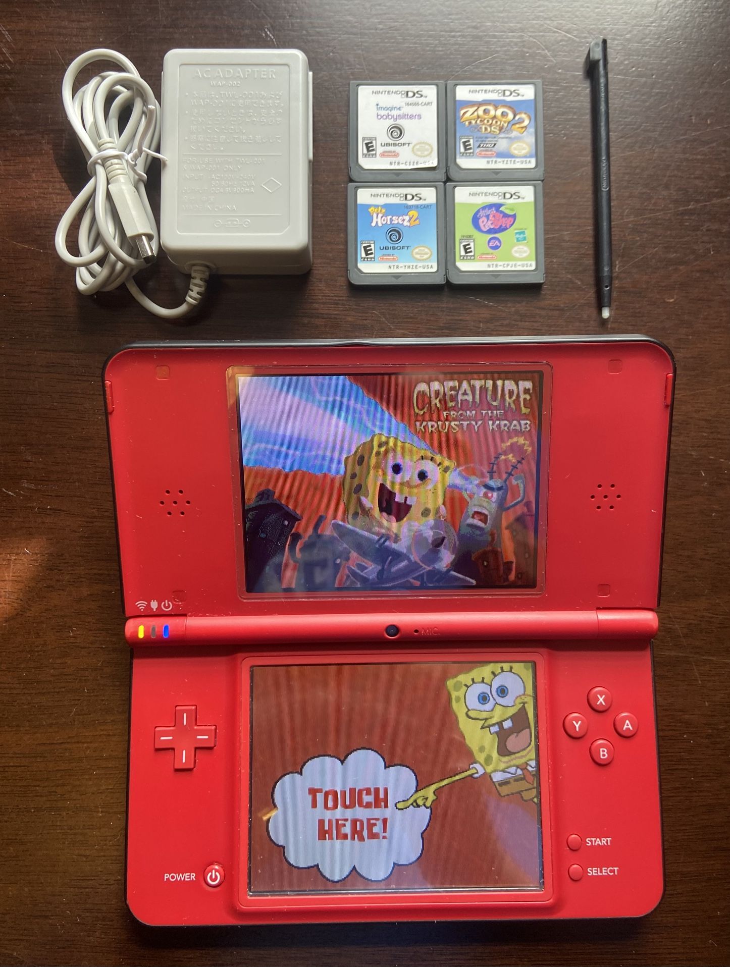 Nintendo DSi XL Console w/ Charger And 5 Games