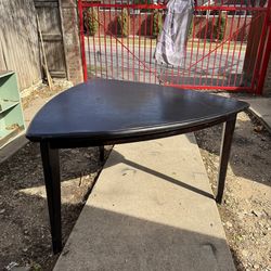 Uniquely Shaped Black Dining Table