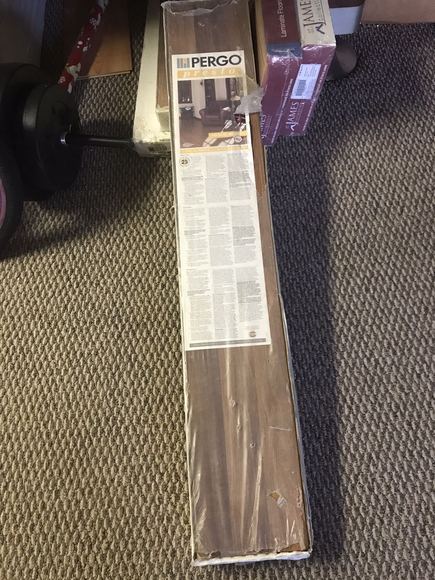 Pergo Presto Laminate Flooring. 4 Cases. Brand New and one Opened case. Take that one free.